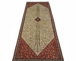 Surface texture of New Abadeh rug with natural Wool and intricate pattern