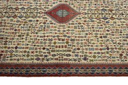 Close-up detail of New Abadeh rug from Iran / Persia showing Wool weave
