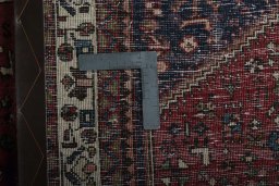 Close-up detail of 2000s Abadeh rug from Iran / Persia showing Wool weave