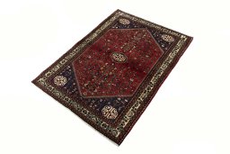 Corner detail of 2000s Abadeh rug showing border pattern and Wool pile