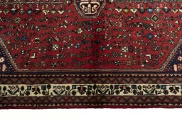 Close-up detail of 2000s Abadeh rug from Iran / Persia showing Wool weave