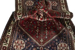 Close-up detail of 2000s Abadeh rug from Iran / Persia showing Wool weave