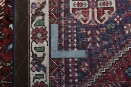 Surface texture of 2000s Abadeh rug with natural Wool and intricate pattern