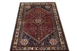Surface texture of 2000s Abadeh rug with natural Wool and intricate pattern