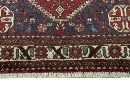 Close-up detail of 2000s Abadeh rug from Iran / Persia showing Wool weave