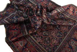 Corner detail of 1930s Afshar rug showing border pattern and Wool pile