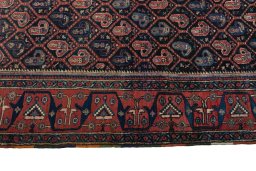 Close-up detail of 1930s Afshar rug from Iran / Persia showing Wool weave