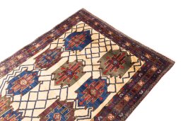 Surface texture of 1970s Afshar rug with natural Wool and intricate pattern