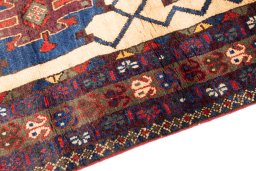 Backside of handmade 1970s Afshar rug showing knot structure and weave density