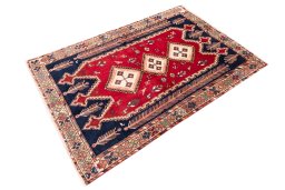 Close-up detail of 1975s Afshar rug from Iran / Persia showing Wool weave