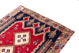 Surface texture of 1975s Afshar rug with natural Wool and intricate pattern