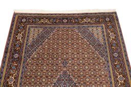 Surface texture of 1990s Ardebil rug with natural Wool and intricate pattern