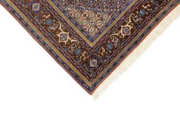 Backside of handmade 1990s Ardebil rug showing knot structure and weave density