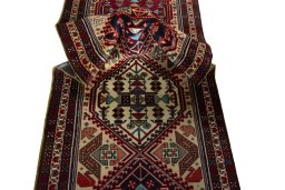 Corner detail of 2000s Ardebil rug showing border pattern and Wool pile
