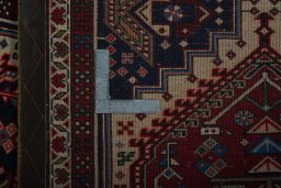 Close-up detail of 2000s Ardebil rug from Iran / Persia showing Wool weave