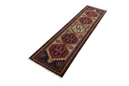Corner detail of 2000s Ardebil rug showing border pattern and Wool pile