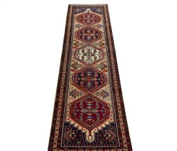 Surface texture of 2000s Ardebil rug with natural Wool and intricate pattern
