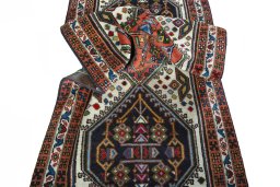Corner detail of 2000s Ardebil rug showing border pattern and Wool pile