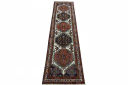 Surface texture of 2000s Ardebil rug with natural Wool and intricate pattern