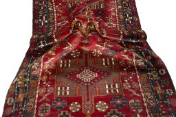Corner detail of 1950s Ardebil rug showing border pattern and Wool pile