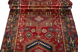 Full view of 1950s Ardebil rug from Iran / Persia, 358 × 110 cm in Red tones