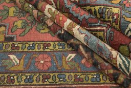 Full view of 1900s Bakhtiar rug from Iran / Persia, 402 × 207 cm in Black tones