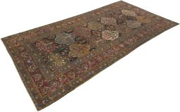 Close-up detail of 1900s Bakhtiar rug from Iran / Persia showing Wool weave