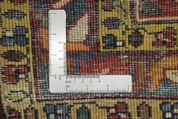 Close-up detail of 1900s Bakhtiar rug from Iran / Persia showing Wool weave
