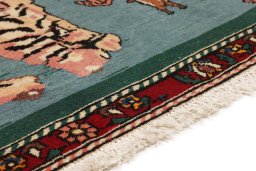 Backside of handmade 1920s Bakhtiar rug showing knot structure and weave density