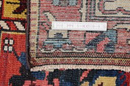 Close-up detail of 1920s Bakhtiar rug from Iran / Persia showing Wool weave