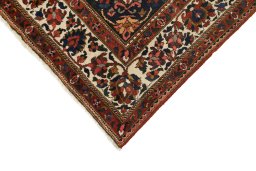 Backside of handmade 1940s Bakhtiar rug showing knot structure and weave density