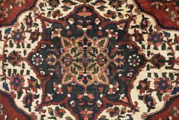 Close-up detail of 1940s Bakhtiar rug from Iran / Persia showing Wool weave