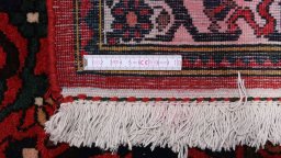 Corner detail of 1940s Bakhtiar rug showing border pattern and Wool pile