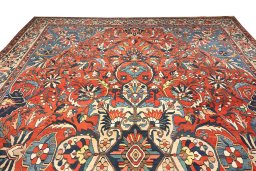 Corner detail of 1900s Bakhtiar rug showing border pattern and Wool pile