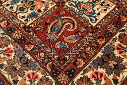 Backside of handmade 1940s Bakhtiar rug showing knot structure and weave density