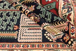 Close-up detail of 1970s Bakhtiar rug from Iran / Persia showing Wool weave