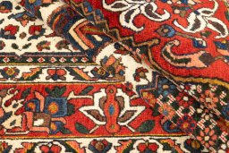 Full view of 1940s Bakhtiar rug from Iran / Persia, 277 × 163 cm in White tones