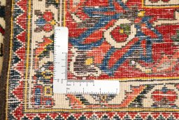 Corner detail of 1940s Bakhtiar rug showing border pattern and Wool pile