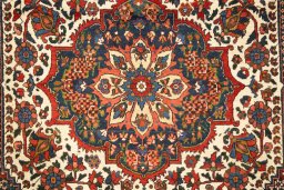 Backside of handmade 1940s Bakhtiar rug showing knot structure and weave density