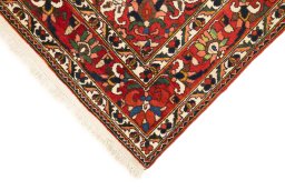 Backside of handmade 1940s Bakhtiar rug showing knot structure and weave density