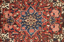 Full view of 1930s Bakhtiar rug from Iran / Persia, 381 × 272 cm in Cream tones