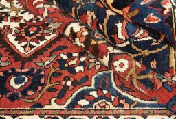Close-up detail of 1930s Bakhtiar rug from Iran / Persia showing Wool weave