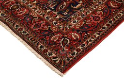 Backside of handmade 1930s Bakhtiar rug showing knot structure and weave density