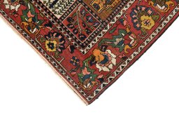 Backside of handmade 1920s Bakhtiar rug showing knot structure and weave density