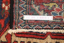 Close-up detail of 1900s Bakhtiar rug from Iran / Persia showing Wool weave