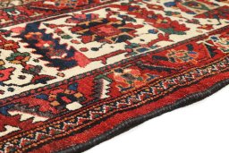 Close-up detail of 1900s Bakhtiar rug from Iran / Persia showing Wool weave