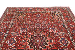 Surface texture of 1920s Bakhtiar rug with natural Wool and intricate pattern