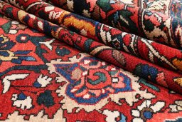 Close-up detail of 1920s Bakhtiar rug from Iran / Persia showing Wool weave