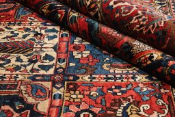 Full view of 1930s Bakhtiar rug from Iran / Persia, 434 × 312 cm in Multi Color tones