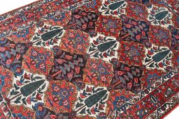 Close-up detail of 1950s Bakhtiar rug from Iran / Persia showing Wool weave